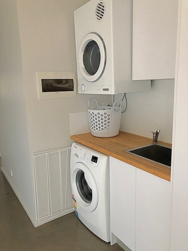 Laundry with Front Loader & Cloths Dryer