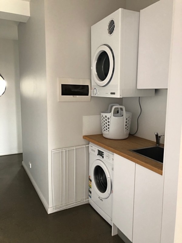 Laundry with Front Loader & Cloths Dryer