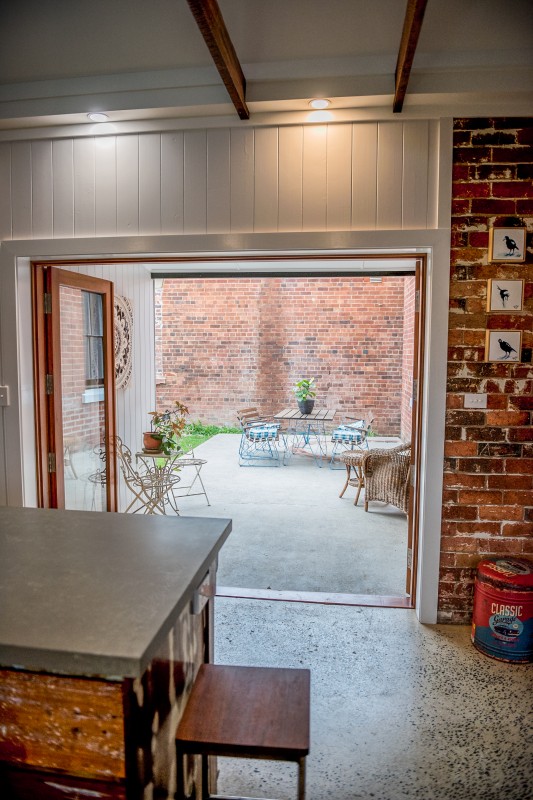 Kitchen opens outdoors to Alfresco dinning area