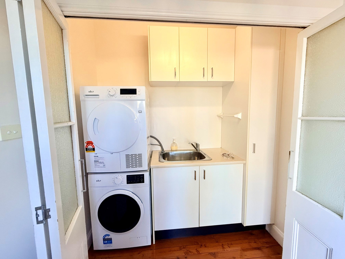 Laundry with Front Loader & Cloths Dryer
